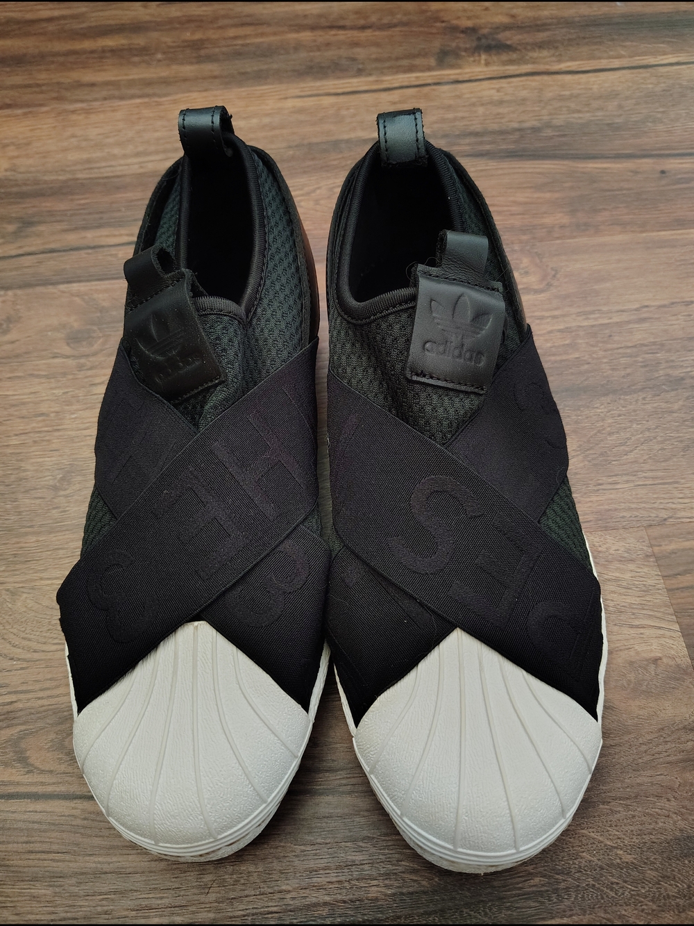 adidas Men’s Black Slip-On Sneakers with White Shell Toe